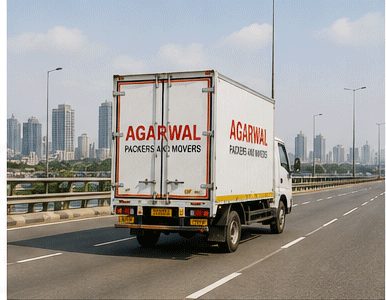 Agarwal Packers and Movers truck on a Mumbai highway