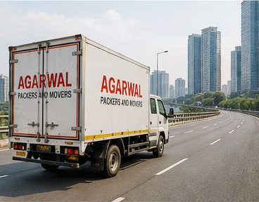 Agarwal Packers and Movers truck driving through Mumbai
